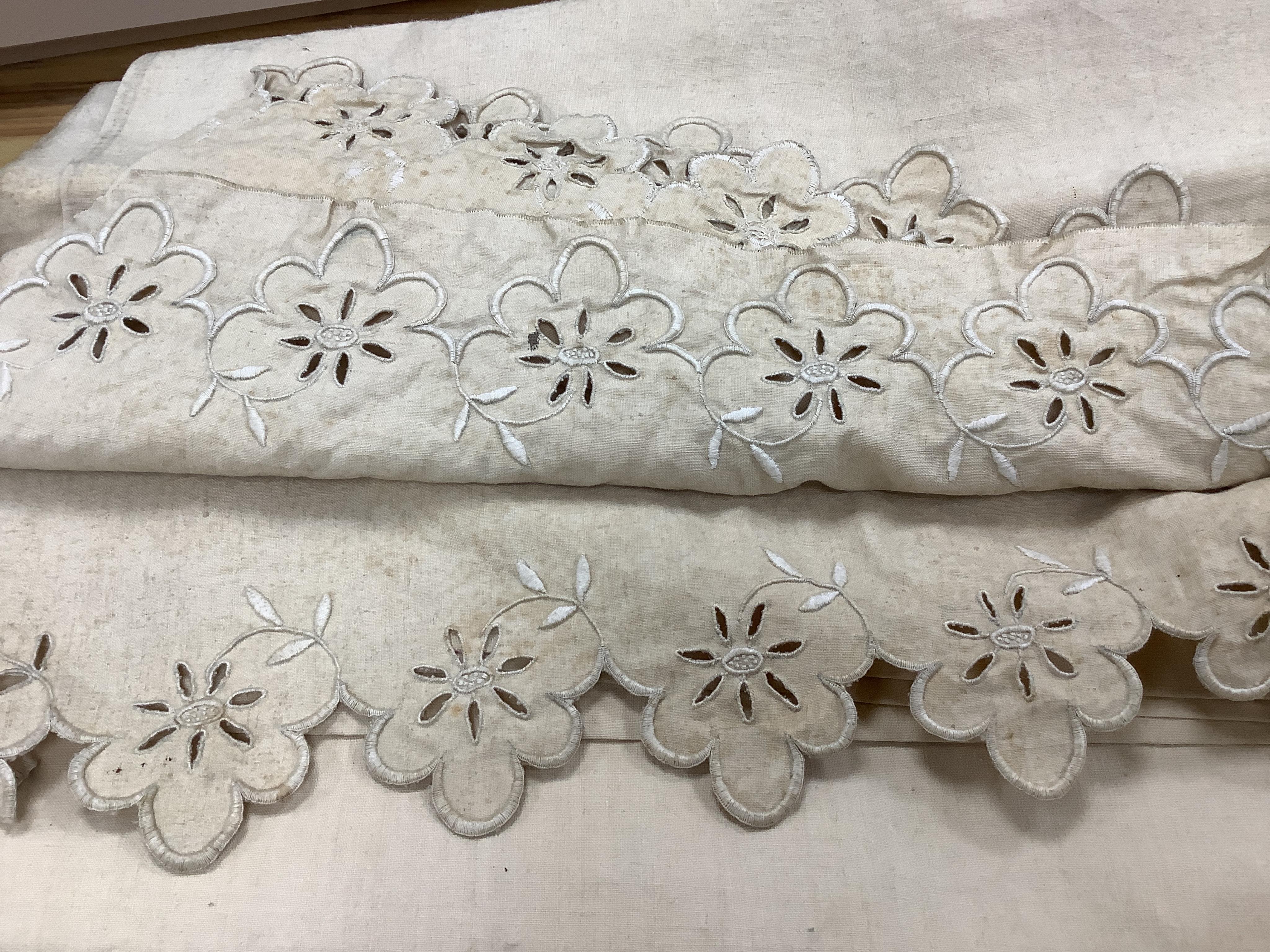 Three French provincial ecru coloured top sheets, with scalloped edged turn backs. One with a deep embroidered turn back, the other two narrower turn backs with cut work and embroidery, one unfinished cut work edge, line